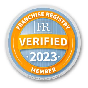 Badge with "Franchise Registry Verified 2023 Member" text on it, designed with an orange banner over a blue background.